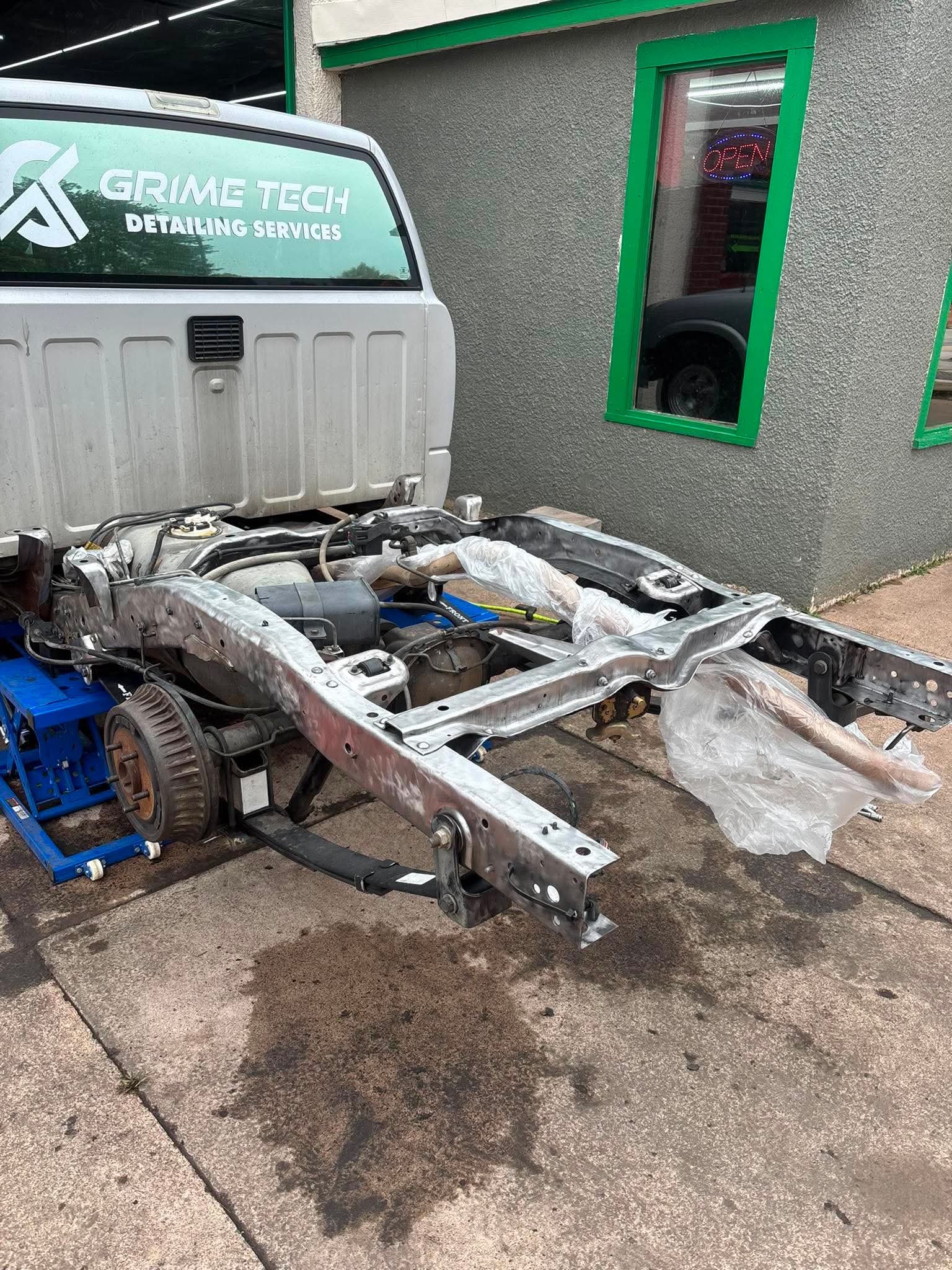 Vehicle undercarriage before WoolWax undercoating